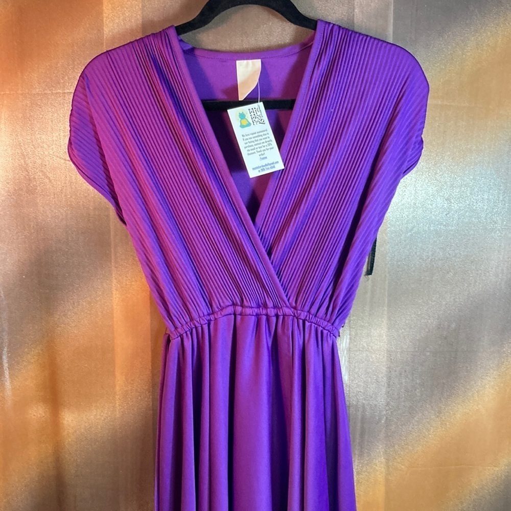 Vintage 70’s stretch wrap eggplant disco dress. 126 38”‎ chest. 10-15” waist